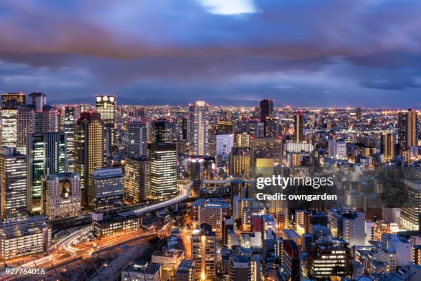 aerial view of osaka skyline at sunset - osaka skyline stock pictures, royalty-free photos & images