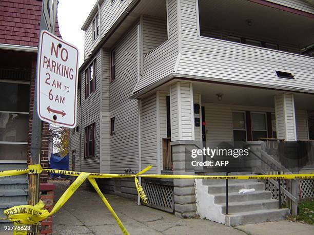 The residence of 50-year-old convicted rapist and alleged serial killer Anthony Sowell is sealed off with police tape on November 4, 2009 in...