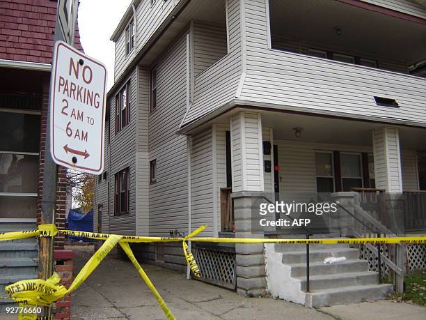 The residence of 50-year-old convicted rapist and alleged serial killer Anthony Sowell is sealed off with police tape on November 4, 2009 in...