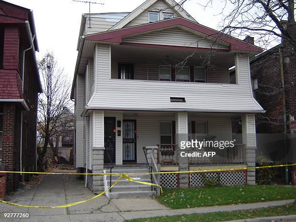 The residence of 50-year-old convicted rapist and alleged serial killer Anthony Sowell is sealed off with police tape on November 4, 2009 in...