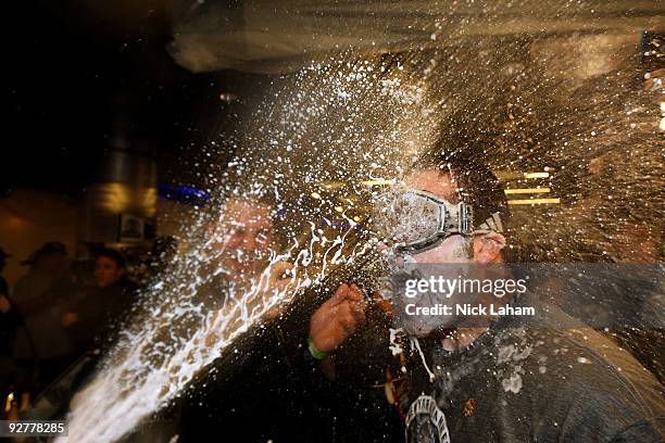 Nick Swisher of the New York Yankees celebrates in the locker room after thei r7-3 win against the Philadelphia Phillies in Game Six of the 2009 MLB...