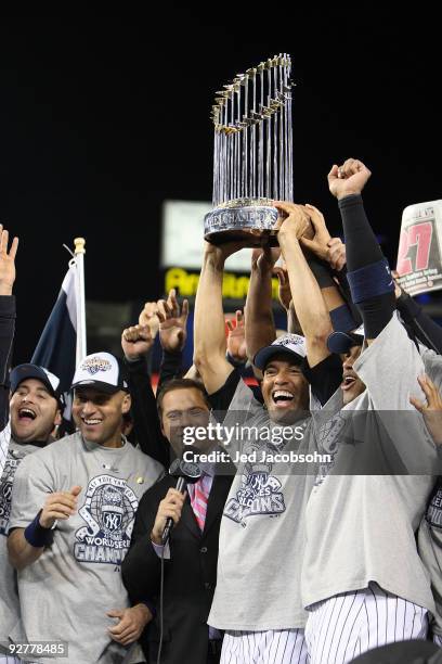 Mariano Rivera of the New York Yankees celebrates with the trophy after their 7-3 win against the Philadelphia Phillies in Game Six of the 2009 MLB...