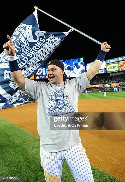 Nick Swisher of the New York Yankees celebrates after a 7-3 win against the Philadelphia Phillies in during Game Six of the 2009 MLB World Series at...