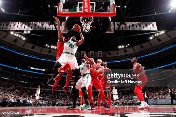 Jonathan Holmes of the Boston Celtics goes to the basket against the Chicago Bulls on March 5, 2018 at the United Center in Chicago, Illinois. NOTE...