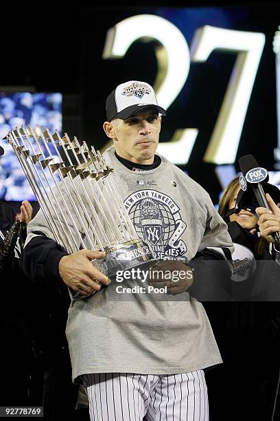 Manager Joe Girardi of the New York Yankees celebrate after their 7-3 win against the Philadelphia Phillies in Game Six of the 2009 MLB World Series...