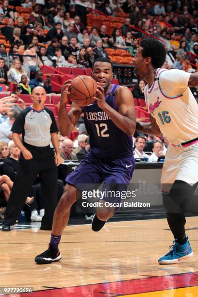 Warren of the Phoenix Suns handles the ball against the Miami Heat on March 5, 2018 at American Airlines Arena in Miami, Florida. NOTE TO USER: User...