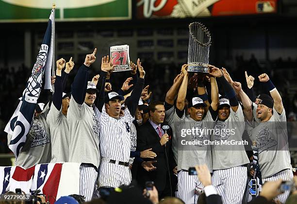 Burnett, Jorge Posada, Derek Jeter, Mariano Rivera Robinson Cano and Nick Swisher of the New York Yankees against the Philadelphia Phillies in Game...