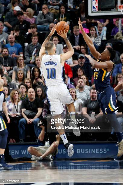 Evan Fournier of the Orlando Magic shoots the ball during the game against the Utah Jazz on March 5, 2018 at vivint.SmartHome Arena in Salt Lake...