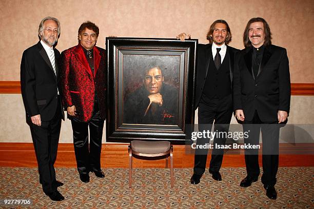 President of the Recording Academy Neil Portnow, honoree Juan Gabriel, official Latin Grammy artist Fabian Perez and Chairman of the Latin Recording...