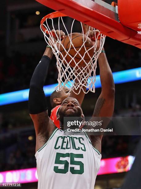 Greg Monroe of the Boston Celtics dunks against the Chicago Bulls at the United Center on March 5, 2018 in Chicago, Illinois. The Celtics defeated...