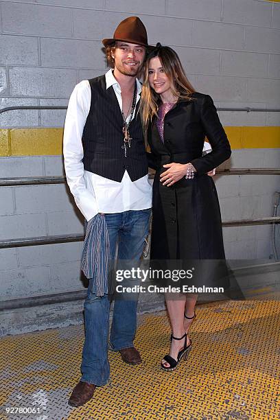 Christopher Backus and wife and actress Mira Sorvino attend the Isaac Mizrahi Live! collection launch celebration at Stage 37 on November 4, 2009 in...