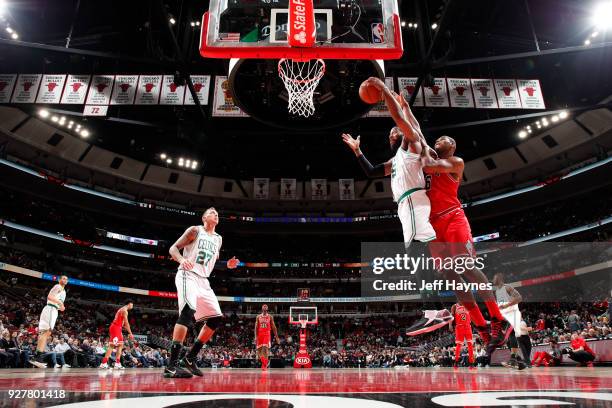 Jonathan Holmes of the Boston Celtics goes to the basket against the Chicago Bulls on March 5, 2018 at the United Center in Chicago, Illinois. NOTE...