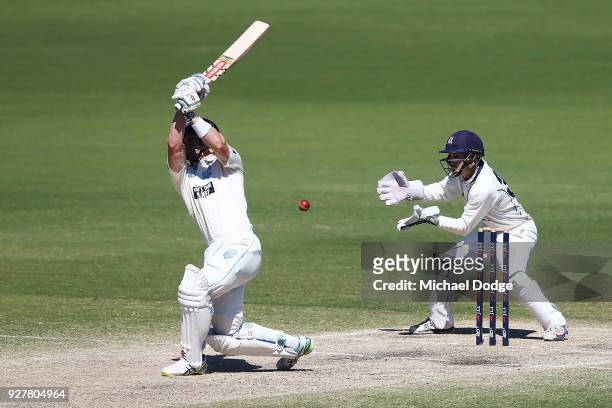 Seb Gotch of Victoria stumps Peter Neville of New South Wales to win during day five of the Sheffield Shield match between Victoria and New South...