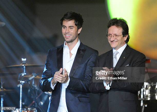 Singer Enrique Iglesias and President of the Latin Recording Academy Gabriel Abaroa onstage during the 2009 Person of the Year honoring Juan Gabriel...