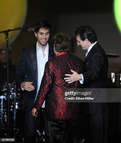 Singer Enrique Iglesias, honoree Juan Gabriel, and President of the Latin Recording Academy Gabriel Abaroa onstage during the 2009 Person of the Year...