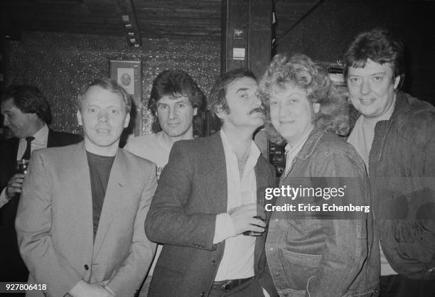 Singer Jim Diamond, Slade drummer Don Powell, music PR Keith Altham, Slade singer Noddy Holder and Slade manager Chas Chandler at the Admiral Duncan...