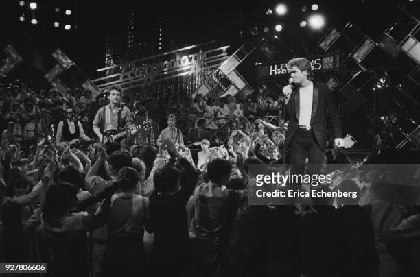 Huey Lewis and The News, on the set of childrens' TV music show 'Razzmatazz' at Tyne Tees Television studios, Newcastle, 1982.