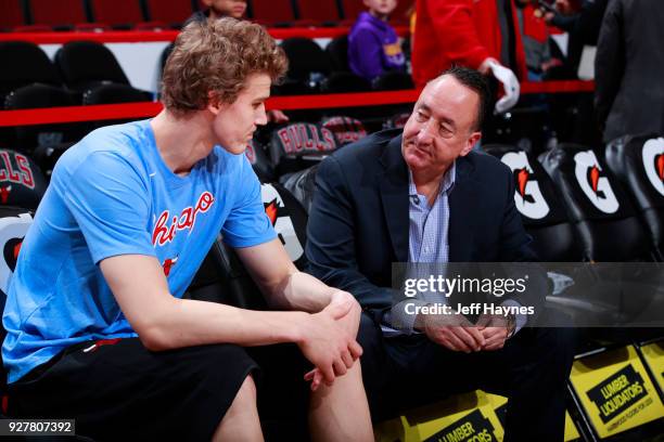 Gar Forman and Lauri Markkanen of the Chicago Bulls talk before the game against the Los Angeles Lakers on January 26, 2018 at the United Center in...