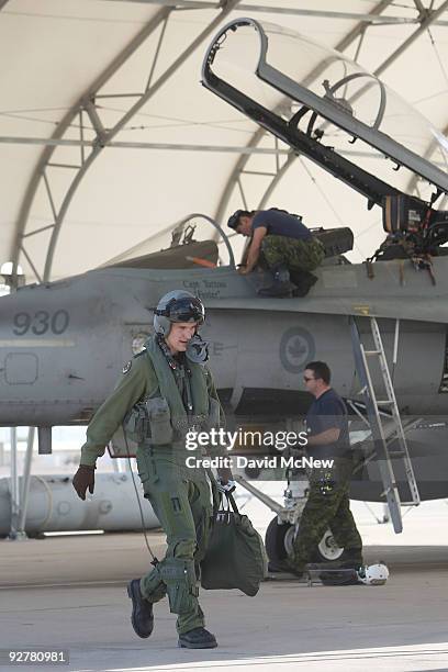 Pilots with the Canadian 410 'Couger' Squadron return to base after a training flight in CF-18 Hornet fighter jets at Naval Air Facility El Centro on...