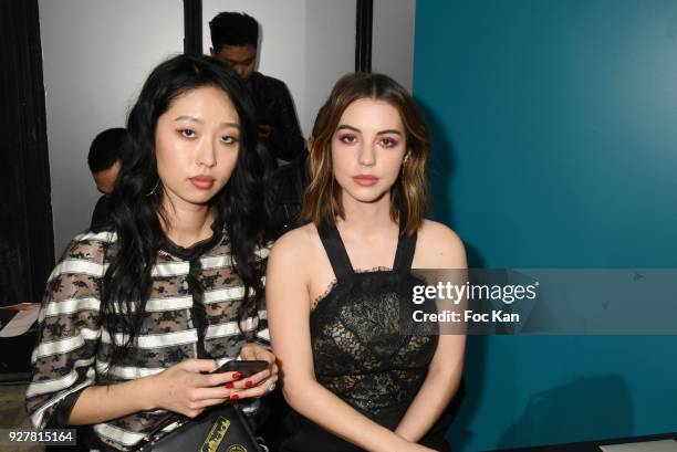Australian actress Adelaide Kane and a guest attend the Shiatzy Chen show as part of the Paris Fashion Week Womenswear Fall/Winter 2018/2019 on March...