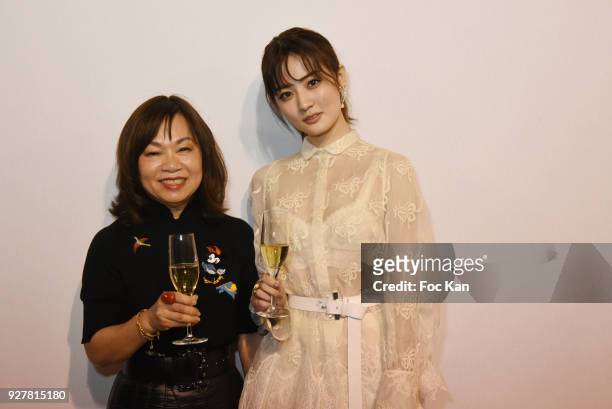 Shatzy Chen designer Designer Wang Chen Tsai-Hsia and aactress Xu Lu attend the Shiatzy Chen show as part of the Paris Fashion Week Womenswear...