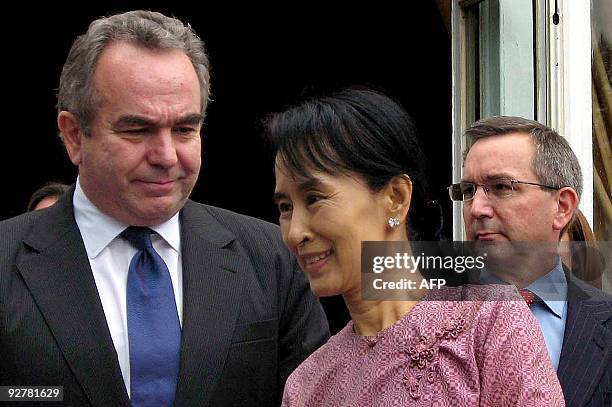 Myanmar democracy icon Aung San Suu Kyi smiles following a meeting with US Assistant Secretary of State for East Asian and Pacific Affairs Kurt...