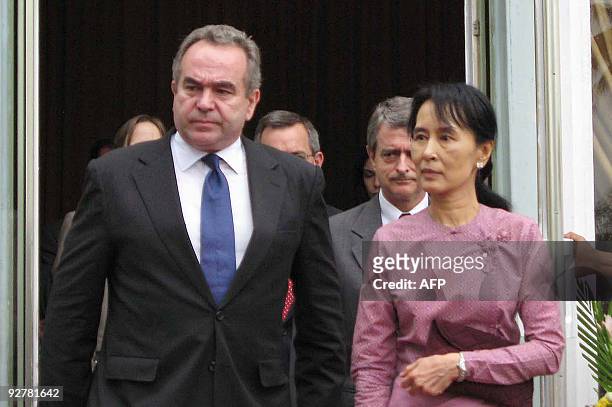 Myanmar democracy icon Aung San Suu Kyi and US Assistant Secretary of State for East Asian and Pacific Affairs Kurt Campbell leave following their...