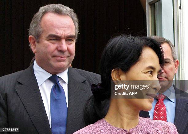 Myanmar democracy icon Aung San Suu Kyi and US Assistant Secretary of State for East Asian and Pacific Affairs Kurt Campbell leave following their...