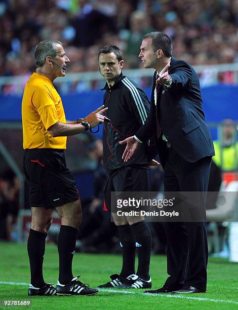 VfB Stuttgart manager Markus Babbel argues with the referee Martin Atkinson of England during the UEFA Champions League Group G match between Sevilla...