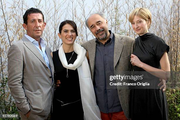 Actors Claudio Casadio, Maya Sansa, director Giorgio Diritti and actress Alba Rohrwacher attend a portrait session for the movie 'L'Uomo Che Verra'...