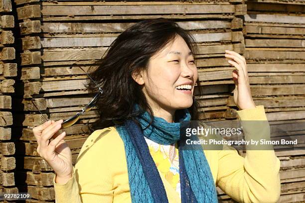 portrait of womans miling - suncheon stock pictures, royalty-free photos & images