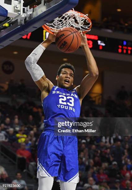 Yoeli Childs of the Brigham Young Cougars dunks against the Saint Mary's Gaels during a semifinal game of the West Coast Conference basketball...