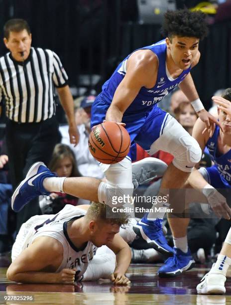 Elijah Bryant of the Brigham Young Cougars steals the ball from Jock Landale of the Saint Mary's Gaels during a semifinal game of the West Coast...