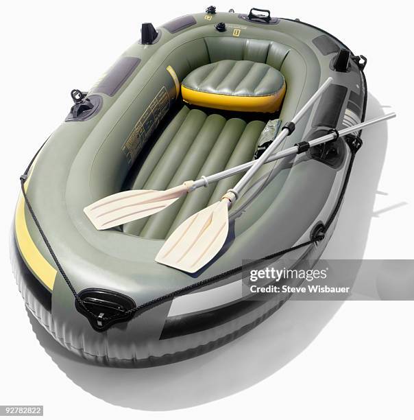 isolated inflatable row boat with oars - steve wisbauer stock pictures, royalty-free photos & images