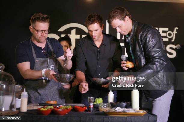 Chef Richard Blais, Mike Bryan and Bob Bryan take part in a cooking demonstration during the Citi Taste of Tennis at Hyatt Regency Indian Wells...