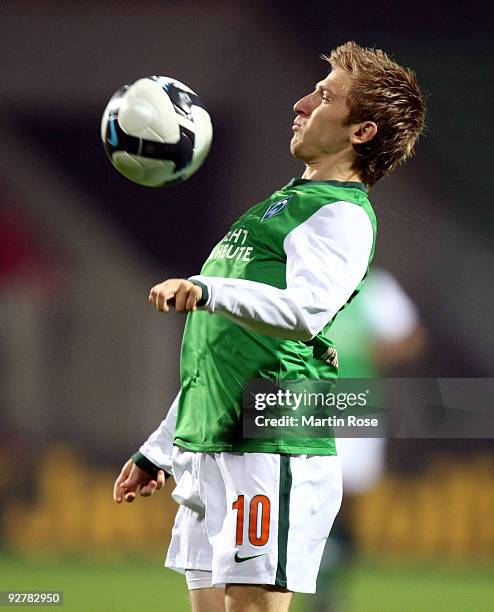 Marko Marin of Bremen stops the ball during the DFB Cup round of 16 match between between Werder Bremen and 1. FC Kaiserslautern at the Weser stadium...