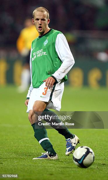 Petri Pasanen of Bremen runs with the ball during the DFB Cup round of 16 match between between Werder Bremen and 1. FC Kaiserslautern at the Weser...