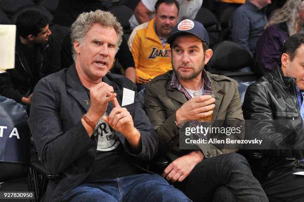 Actor Will Ferrell and race car driver Shane van Gisbergen attend a basketball game between the Los Angeles Lakers and Portland Trail Blazers at...