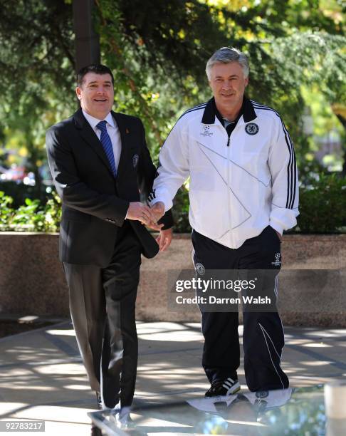 Chelsea manager Carlo Ancelotti talks to Chelsea CEO Ron Gourlay before the Champions League Group D match between Atletico Madrid and Chelsea at the...