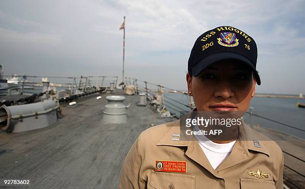 January Crivello, Chief engineer of USS HIGGINS destroyer, stands at the warship which is docked at the Israeli Mediterranean port of Haifa, as part...