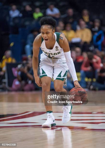 Bayor alexis Morris calling out to her team as she directs traffic versus Texas Univsersity during the Big 12 Women's Championship on March 05, 2018...