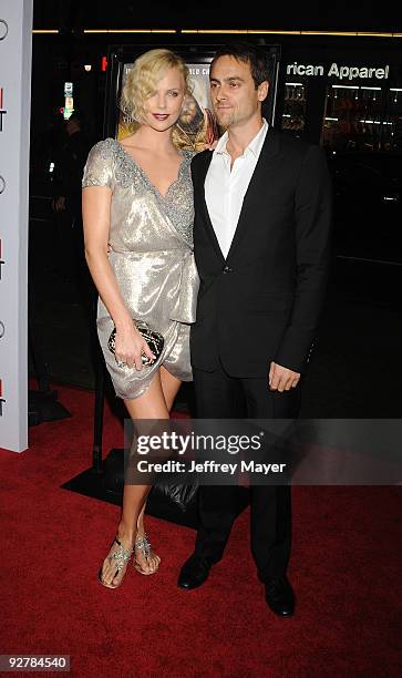 November 04: Actors Charlize Theron and Stuart Townsend arrives at the AFI Fest 2009 gala screening of "The Road" at Grauman's Chinese Theatre on...
