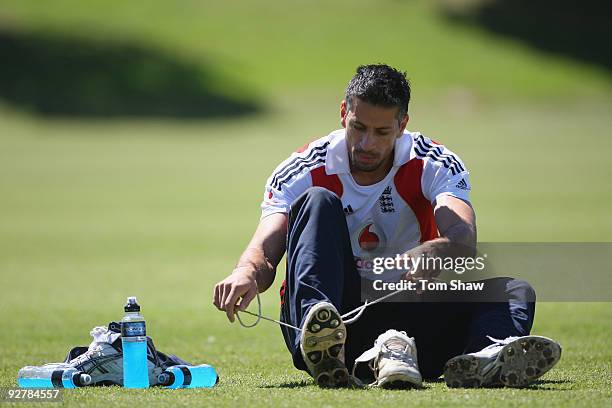 Sajid Mahmood of England puts on his boots during the England nets session at The University of Free State on November 5, 2009 in Bloemfontein, South...