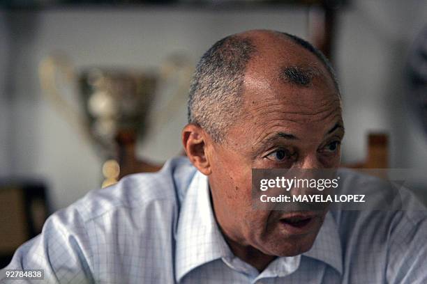 Former Uruguayan football player Julio Cesar "Pocho" Cortes talks on October 28 in his house east of San Jose, Costa Rica, during an interview with...