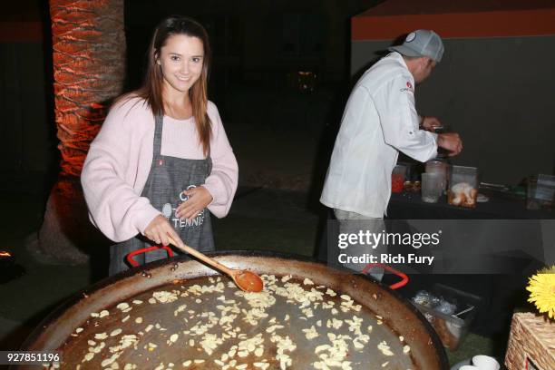 Lauren Davis visits a chef station during the Citi Taste of Tennis at Hyatt Regency Indian Wells Resort & Spa on March 5, 2018 in Indian Wells,...