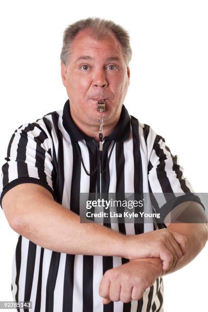 referee with holding signal - referee blowing whistle stock pictures, royalty-free photos & images