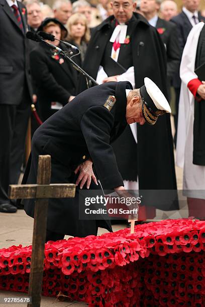 The Duke of Edinburgh plants a remembrance day cross outside Westminster Abbey to officially open the Royal British Legion's Field of Remembrance on...