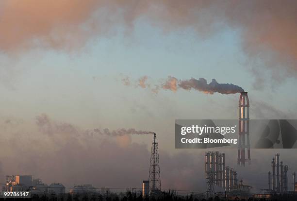 Chemical plants release trails of steam in Kamisu City, Ibaraki Prefecture, Japan, on Friday, Dec. 14, 2007. Japan Prime Minister Taro Aso said the...