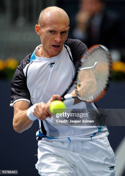 Nikolay Davydenko of Russia hits a double handed backhand in his second round match against Juan Monaco of Argentina during the ATP 500 World Tour...