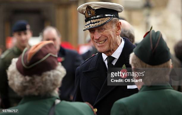 Prince Philip, Duke of Edinburgh talks to ex-members of the Auxiliary Territorial Service outside Westminster Abbey at the official opening of the...